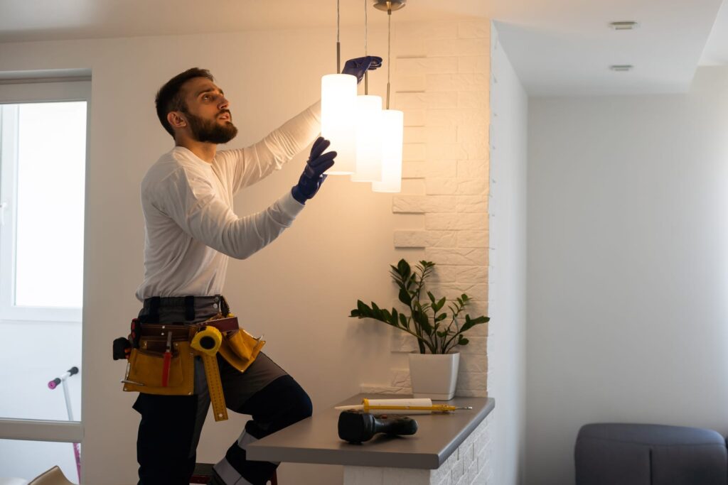 electrician installing LED lights