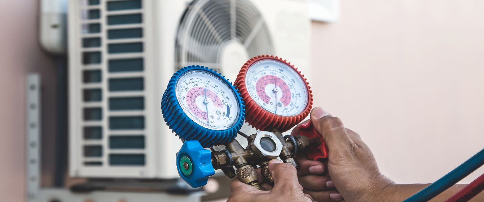 electrician with pressure guage Sinnamon park