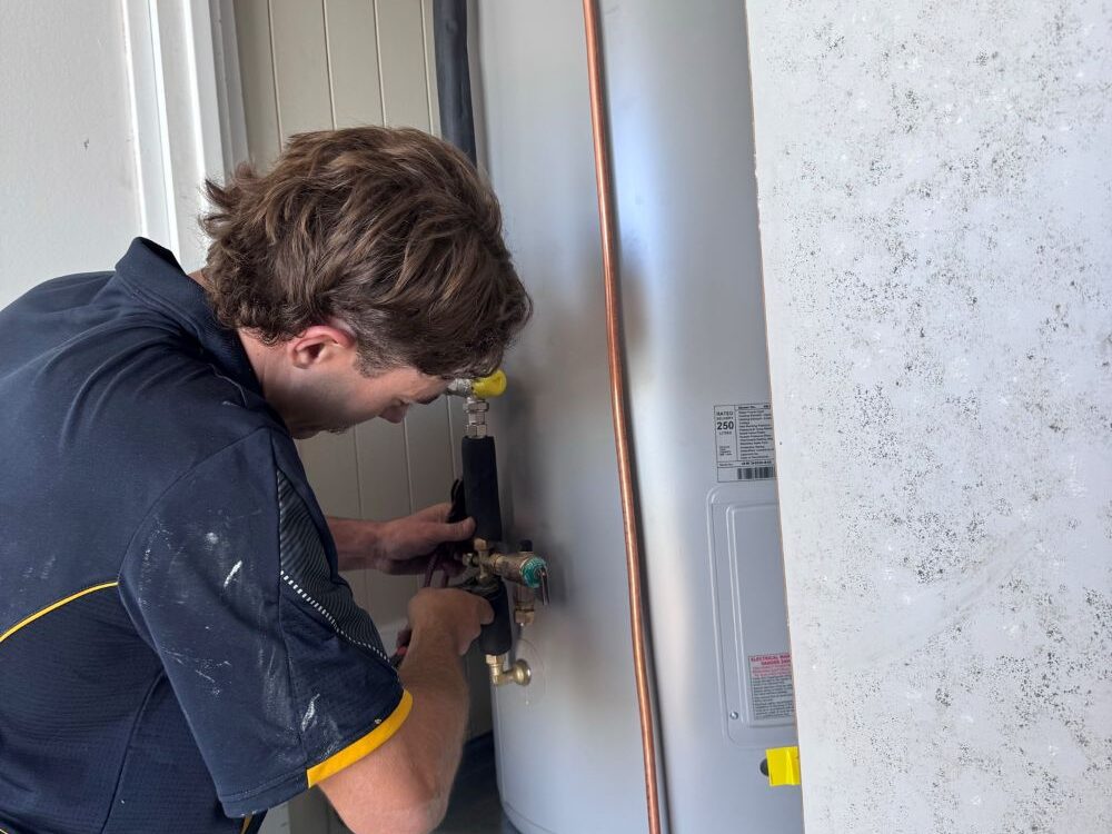 working on hot water system gold coast